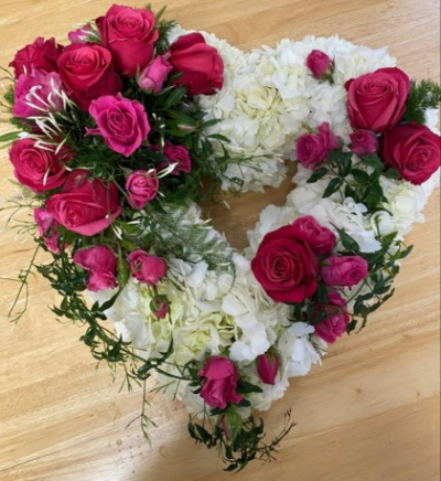 Open Hydrangea Heart - Based Hydrangea 15" open heart with a mixed size Rose spray with jasmine and soft foliage sprays

Roses can be any colour of your choice